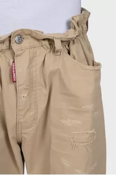 Men's beige trousers with abrasions