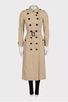 Beige fitted button-down trench coat with belt