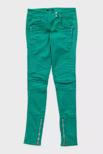 Green skinny fit jeans with decorative zippers