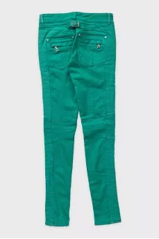 Green skinny fit jeans with decorative zippers
