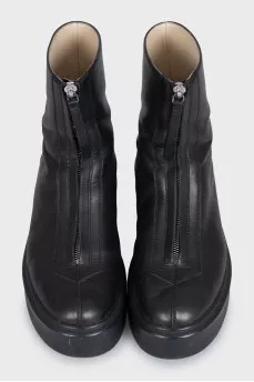 Black leather boots with a zipper