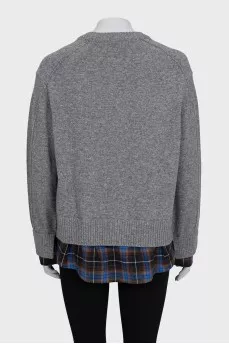 Gray sweater with plaid inserts