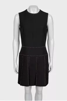 Black sleeveless dress with gold trim