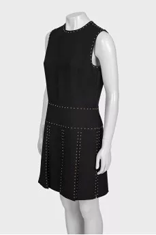 Black sleeveless dress with gold trim