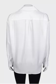 Loose-fitting button-down blouse with ties
