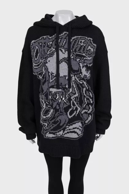 Oversized, elongated hoodie with a printed pattern