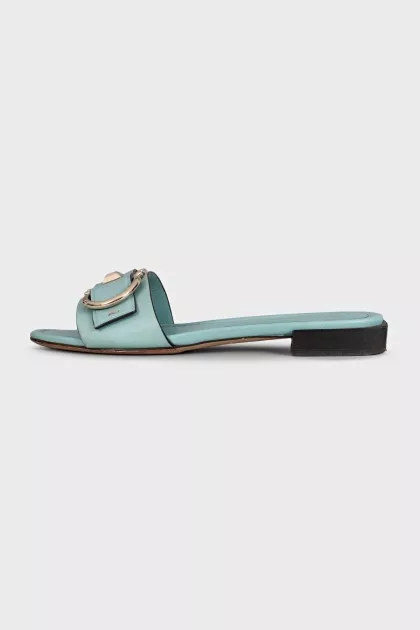 Blue leather flip-flops with gold trim