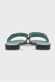 Blue leather flip-flops with gold trim