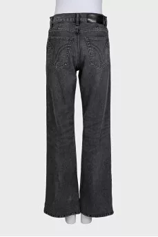 Wide-leg mid-rise jeans with distressing