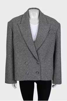 Double-breasted wool coat with a short cut