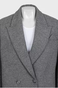 Double-breasted wool coat with a short cut