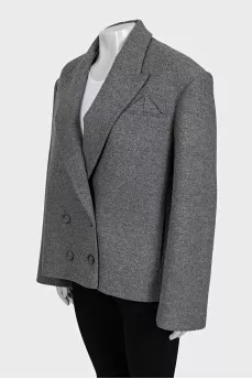 Double-breasted wool coat with a short cut