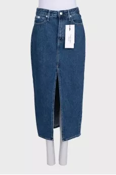 Blue denim skirt with a slit and tag