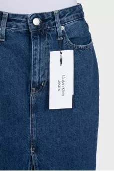 Blue denim skirt with a slit and tag