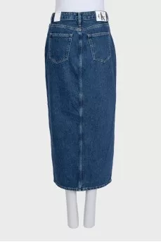 Blue denim skirt with a slit and tag