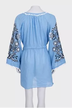 Blue linen dress decorated with embroidery