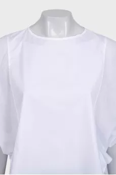 A loose blouse decorated with rhinestones