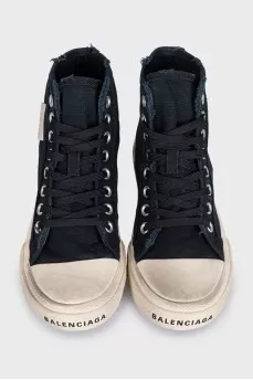 Black high-top sneakers with a distressed effect