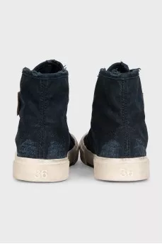 Black high-top sneakers with a distressed effect