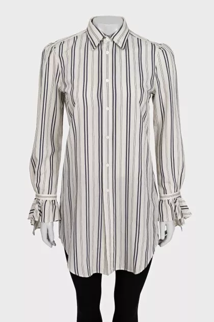 White shirt with striped print and tag