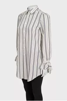 White shirt with striped print and tag