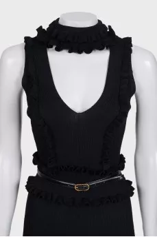 A fitted dress decorated with ruffles