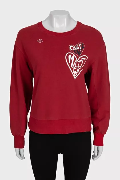 Red straight-cut sweatshirt with a print