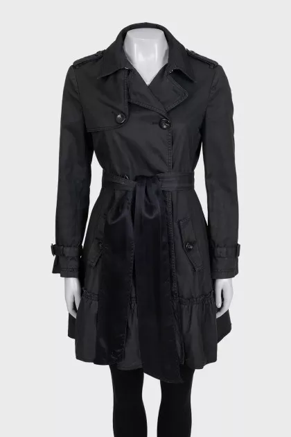Dark green fitted trench coat with belt