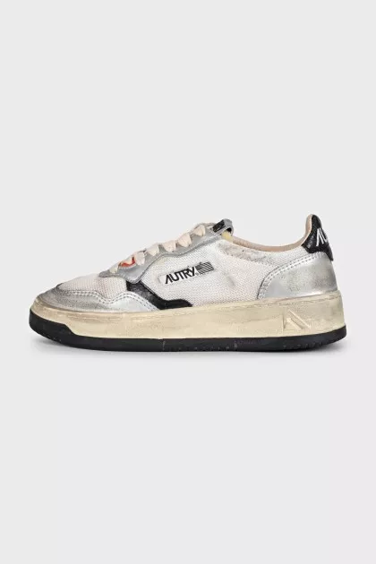 Gray sneakers with a distressed effect