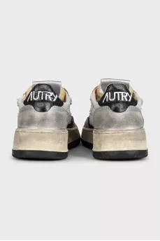 Gray sneakers with a distressed effect