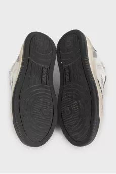 Gray sneakers with a distressed effect
