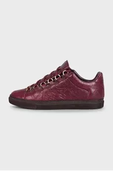 Red leather sneakers