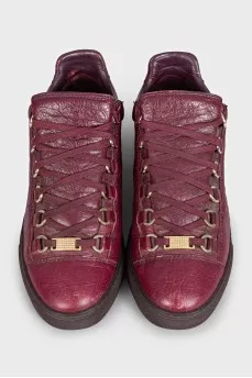 Red leather sneakers