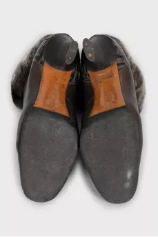 Leather ankle boots with fur trim and heels