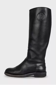 Black leather boots with brand logo