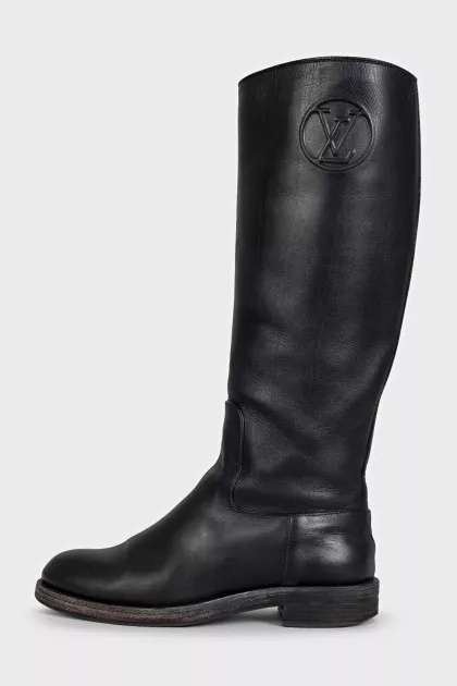 Black leather boots with brand logo
