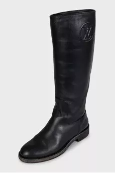 Black leather boots with brand logo