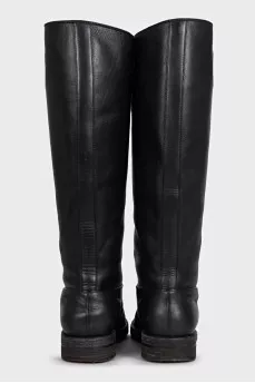 Black leather boots with brand logo