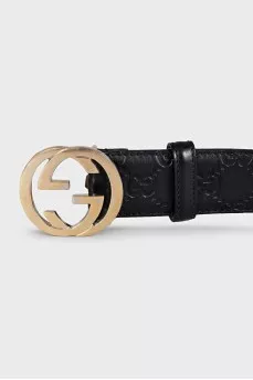 Black leather belt with embossed signature monogram