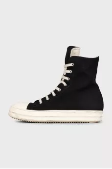 Black high-top sneakers with a zipper and laces
