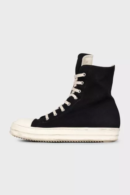 Black high-top sneakers with a zipper and laces