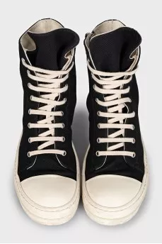 Black high-top sneakers with a zipper and laces