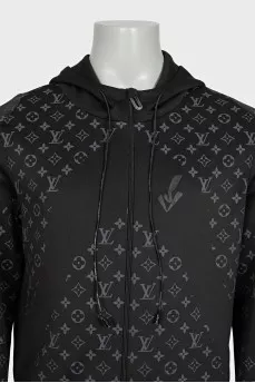 Men's black sports jacket with a signature print