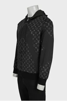 Men's black sports jacket with a signature print