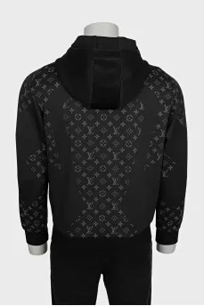 Men's black sports jacket with a signature print