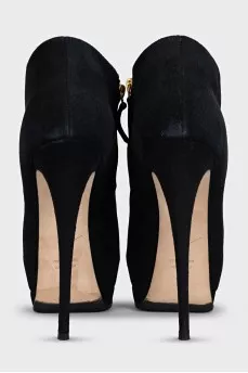 Black suede heeled ankle boots