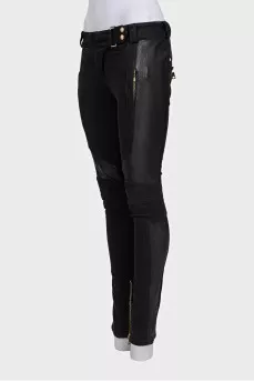 Black trousers with perforations