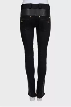 Black trousers with perforations