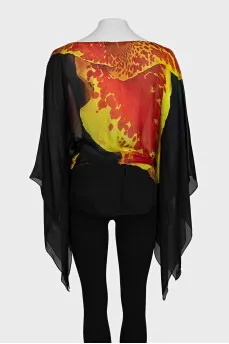 Semi-sheer printed blouse with a belt
