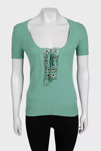 Зелена футболка декорована шнурівкою